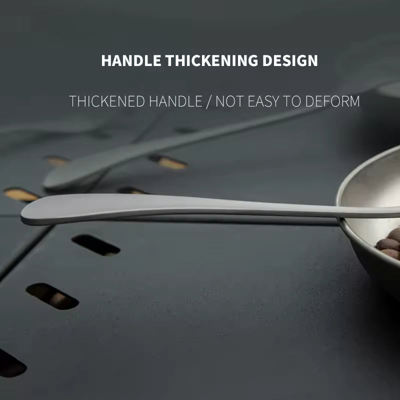 Spoon with thickened handle on a dark background