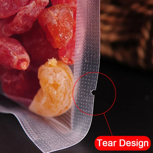 Clear plastic bag with a tear design feature, showing a close-up of the tear point.