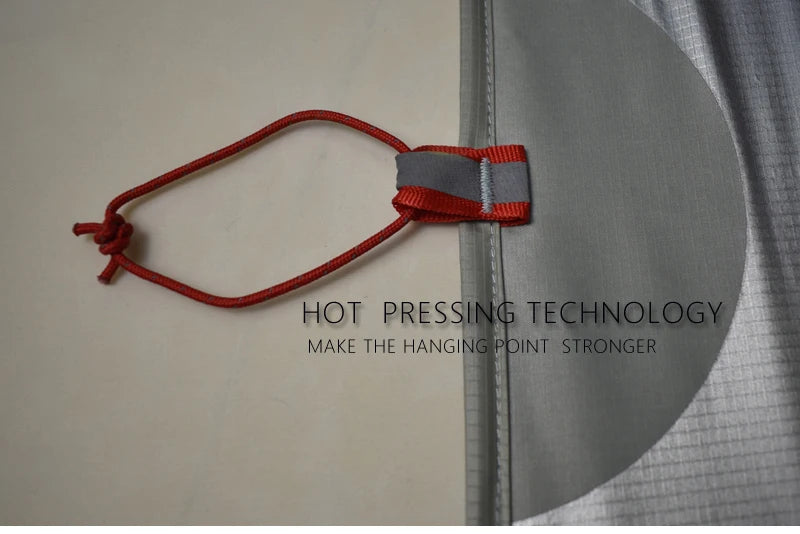 Red string with a knot tied to gray fabric, highlighting hot pressing technology.