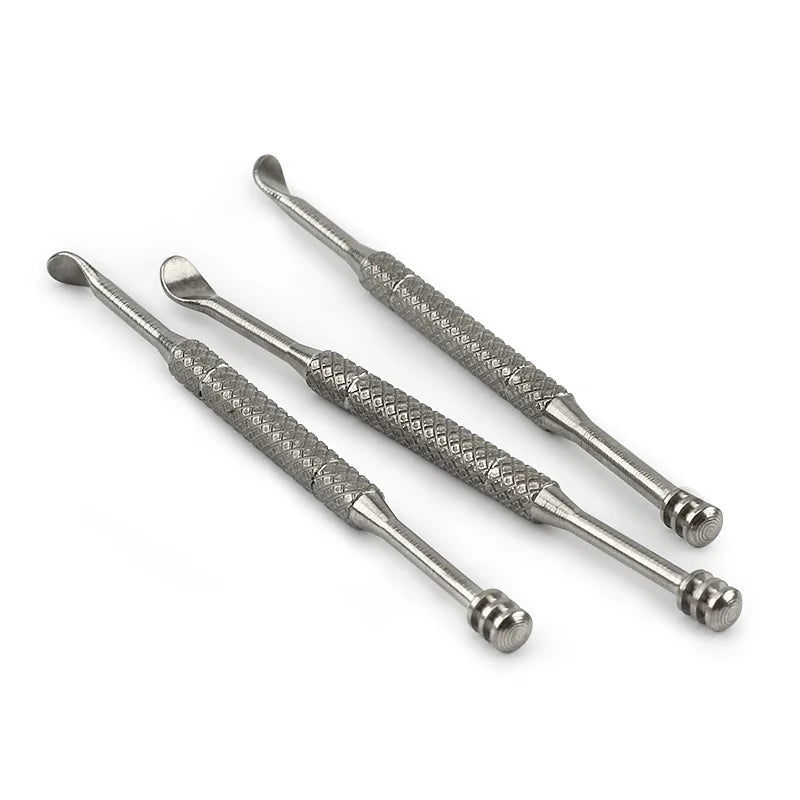 Set of 3 metal tools with textured handles on a white background