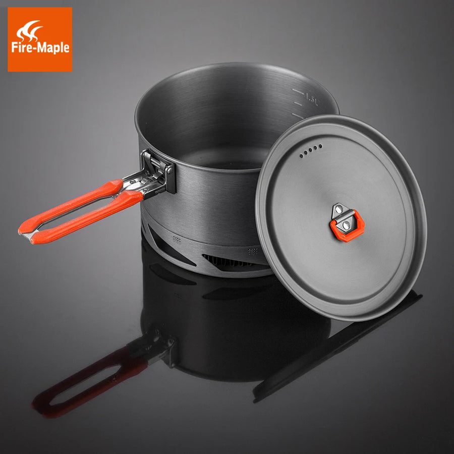 Cooking pot with lid and orange handles on a dark background, featuring Fire-Maple brand.
