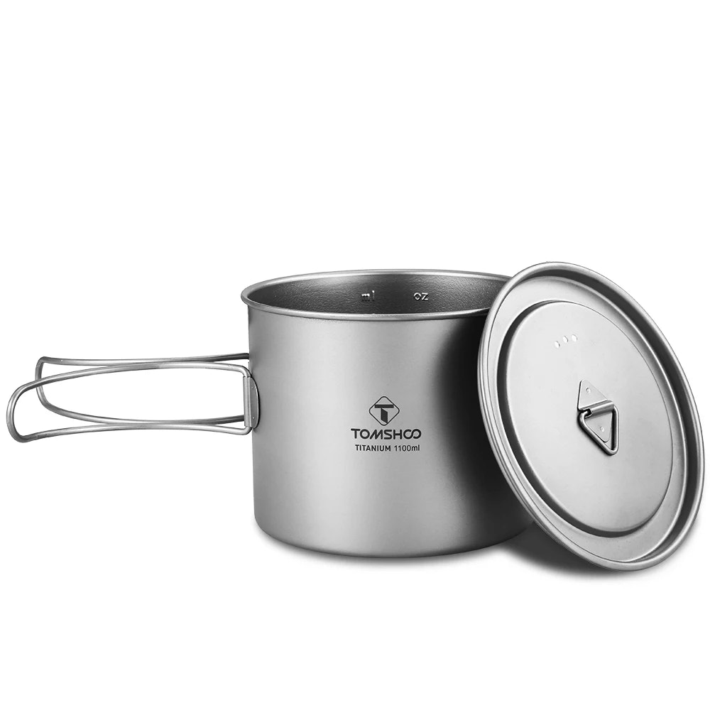 Titanium pot with lid on a white background