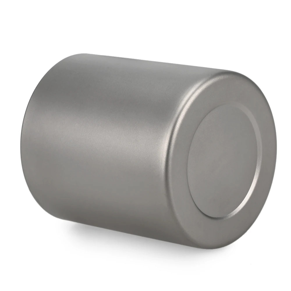 Metallic cylindrical object on a white background