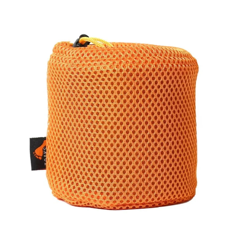 Orange mesh pouch with a brand tag on a white background
