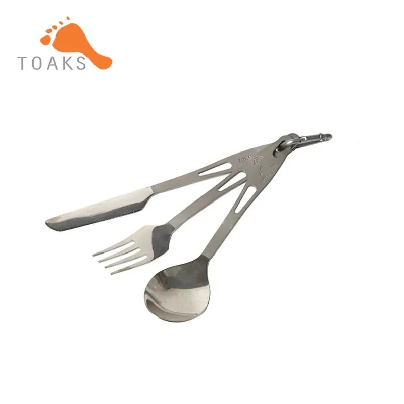 Set of cutlery with spoon, fork, and knife on a white background, featuring the Toaks brand logo.