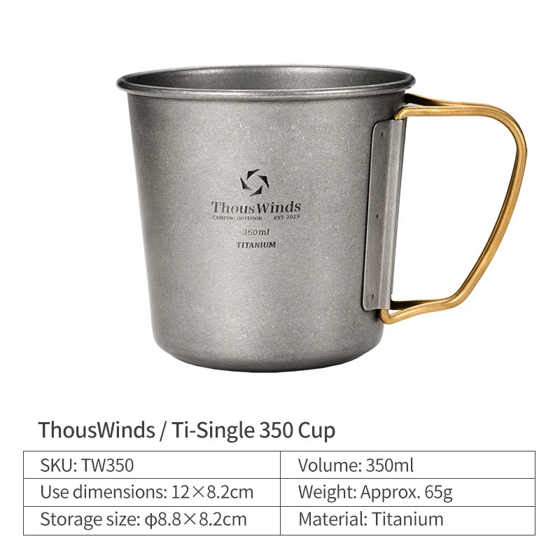 Titanium mug with gold handle on a white background, featuring ThousWinds branding.