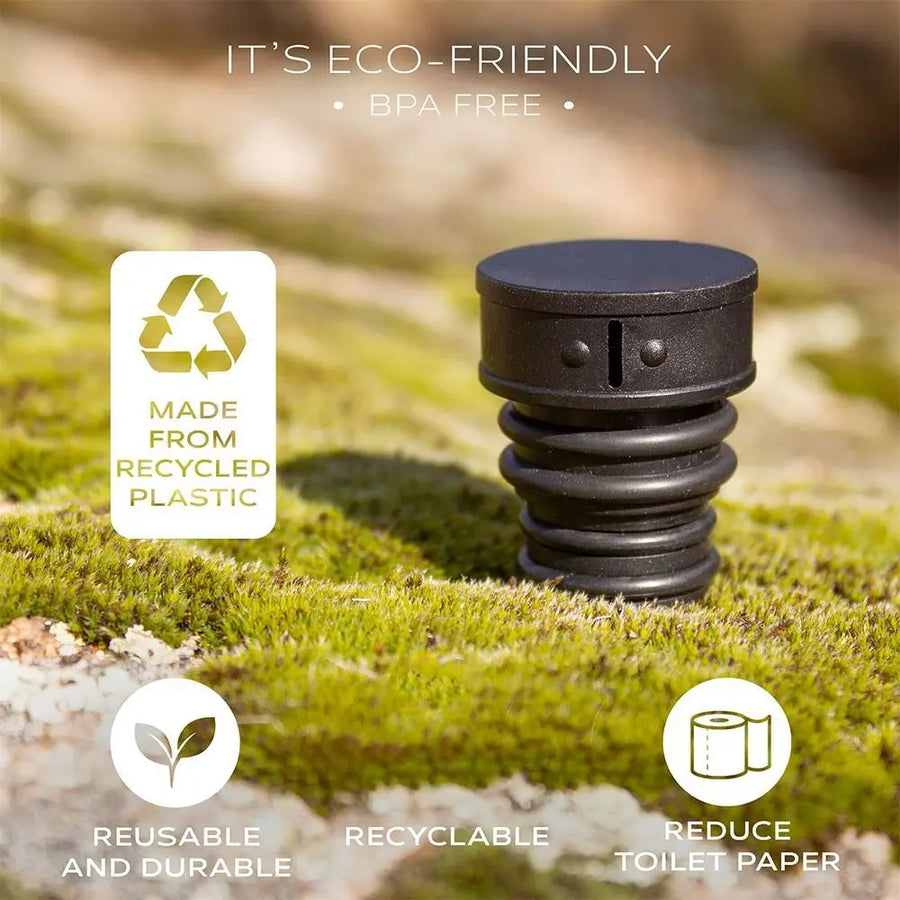 Black plastic device on grass with eco-friendly features highlighted