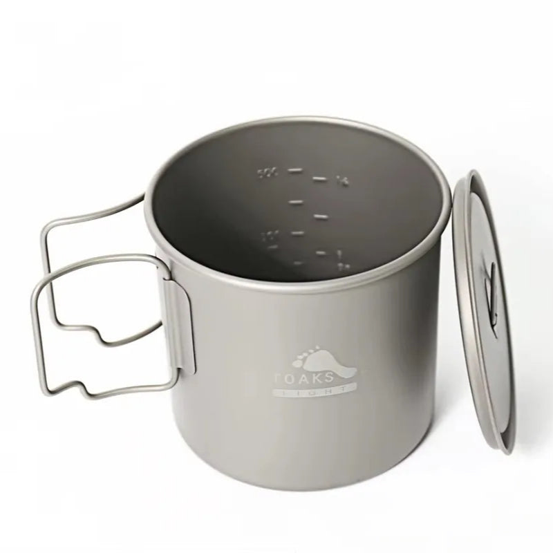 titanium camping mug with lid on a white background