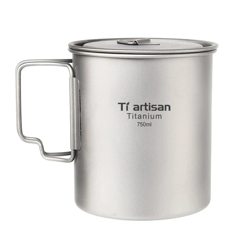 titanium mug with handle and 'Ti artisan' branding on a white background
