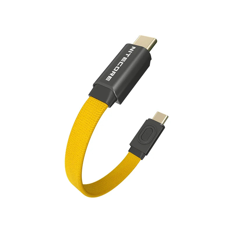 Nitecore USB cable with yellow braided cord on a white background