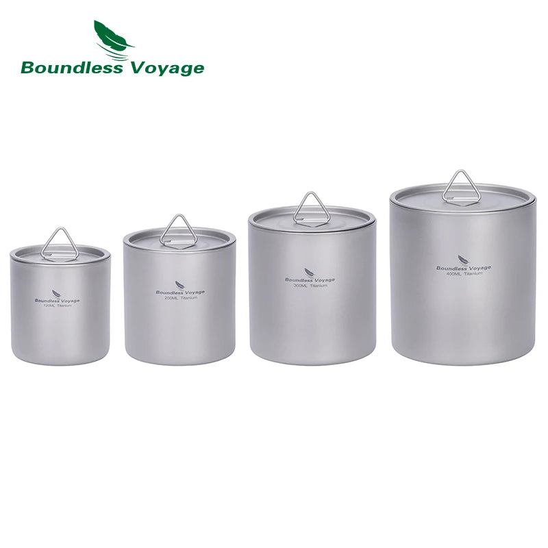 Set of four silver canisters with lids on a white background, featuring 'Boundless Voyage' branding.