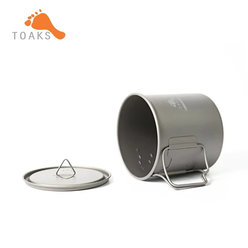 Camping pot with lid on a white background, featuring the Toaks brand.