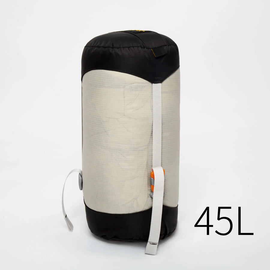 45L compression sack with black top and white body on a light gray background
