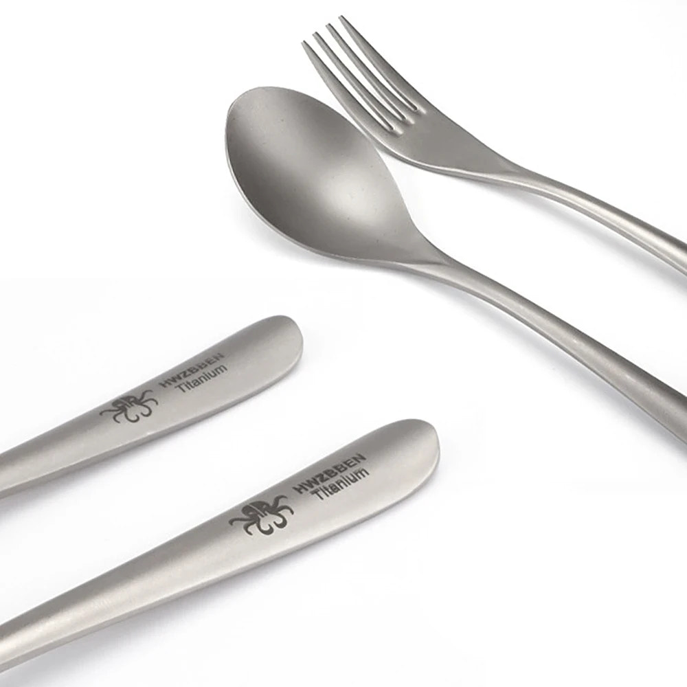 titanium cutlery set with branding on a white background