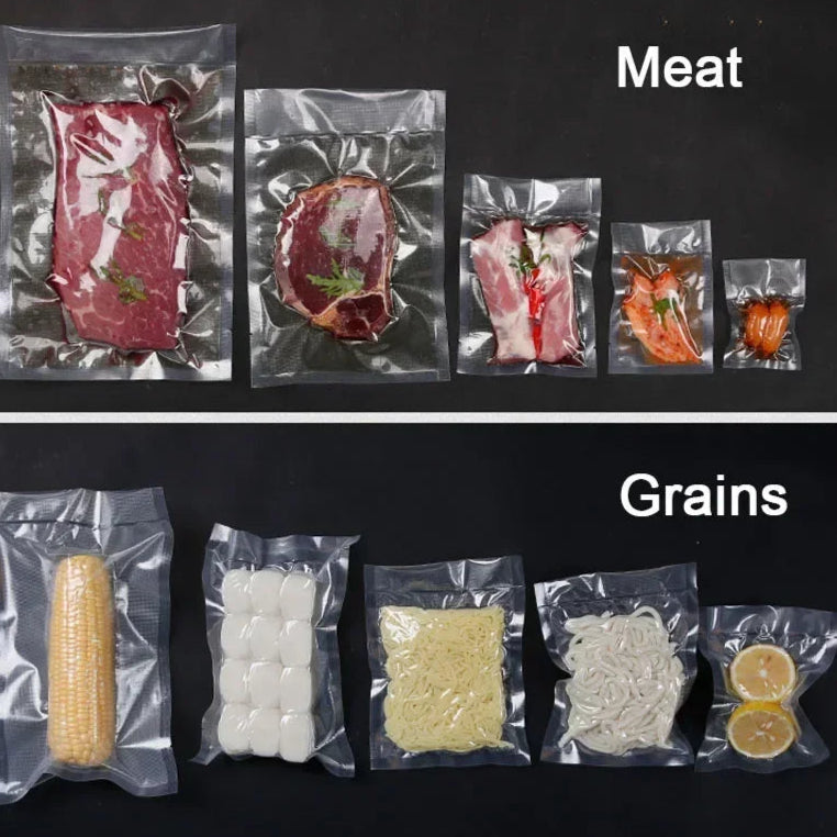 Vacuum-sealed packages of meat and grains on a black background