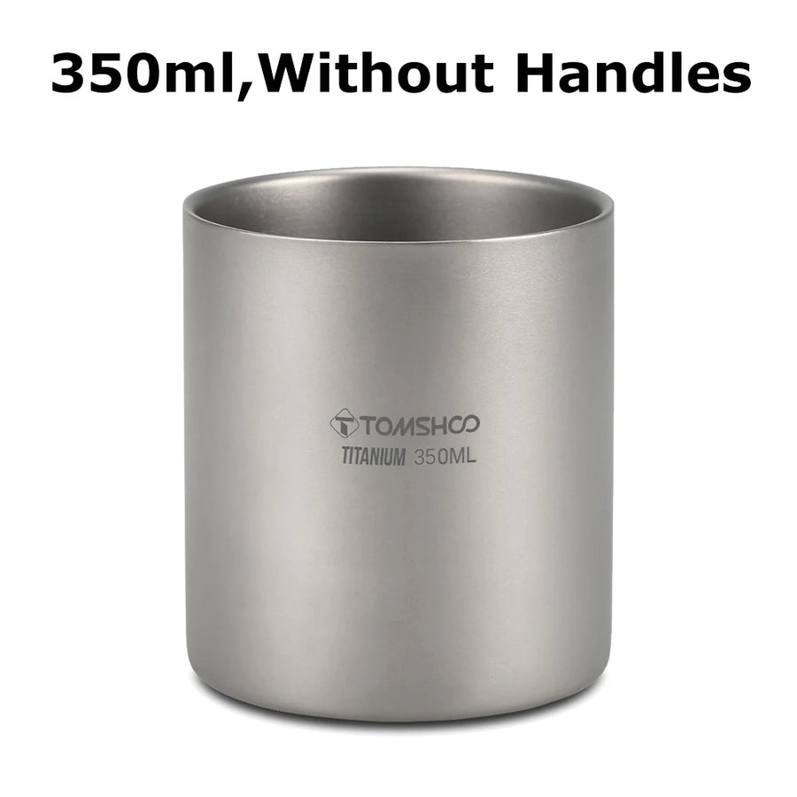 Titanium cup without handles on a white background
