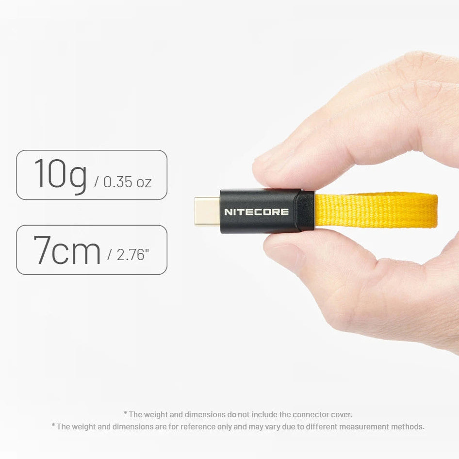 Hand holding a small device with Nitecore branding, showing weight and dimensions on a white background.