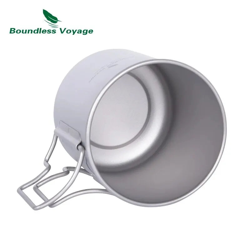 Camping mug with handle on a white background, featuring 'Boundless Voyage' brand.