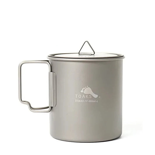 Titanium mug with handle and lid on a white background