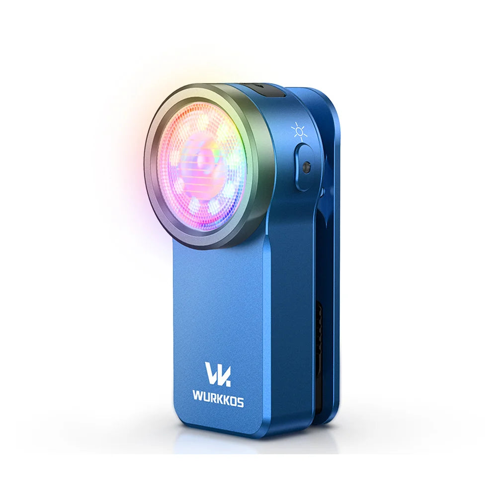 Blue clip light with colorful light effects on a white background