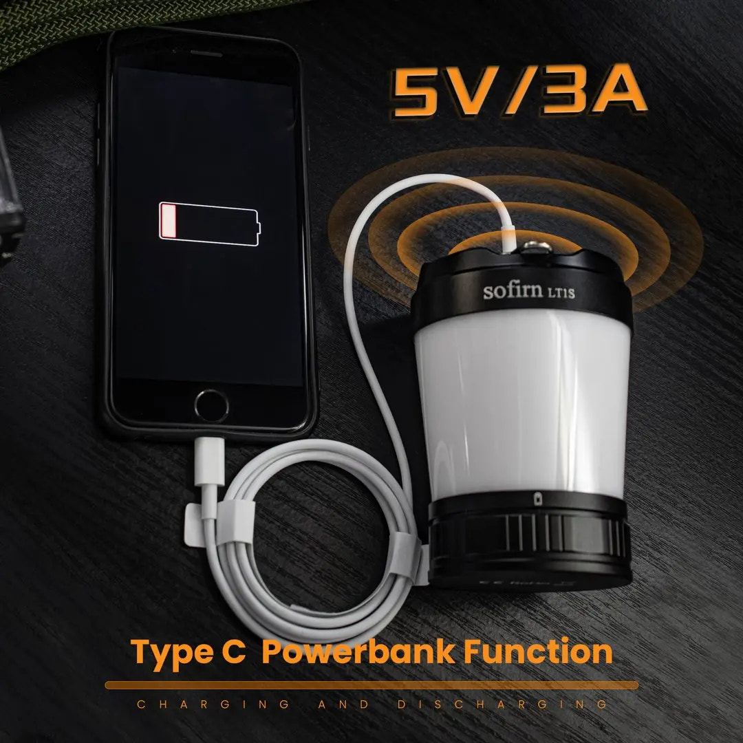 Lantern with charging cable connected to a smartphone on a dark background, featuring 'Sofirn LT15' branding.