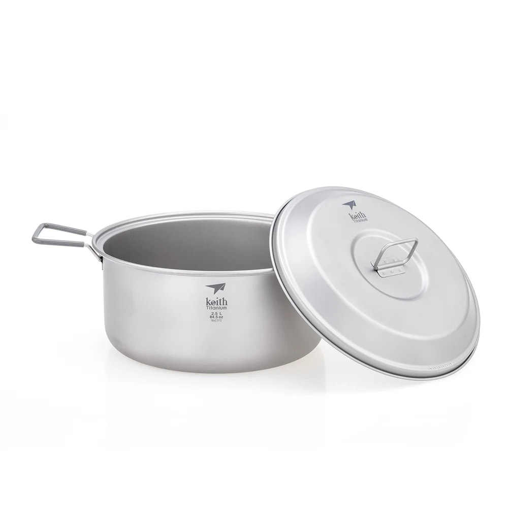 Camping pot with lid on a white background