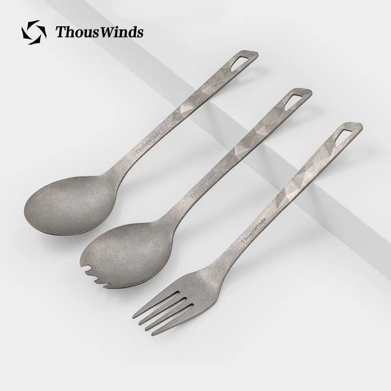 Set of ThousWinds titanium cutlery on a white background