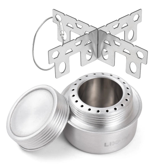 aluminium camping stove with foldable wind guard on a white background