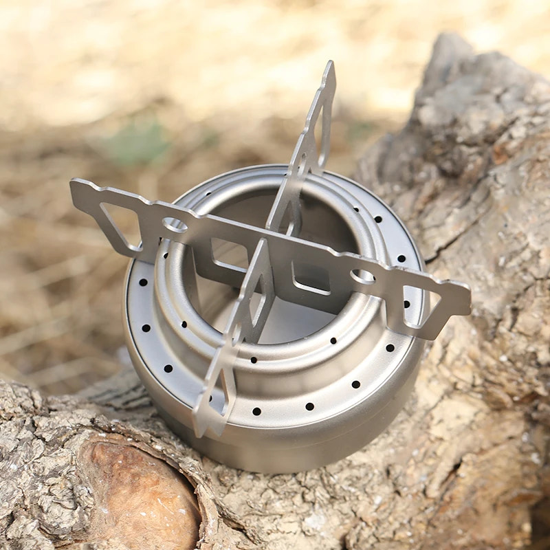 Portable camping stove on a wooden surface