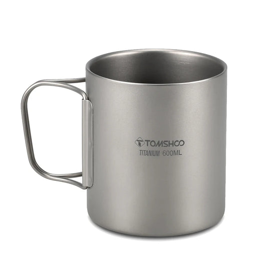 titanium mug with handle on a white background