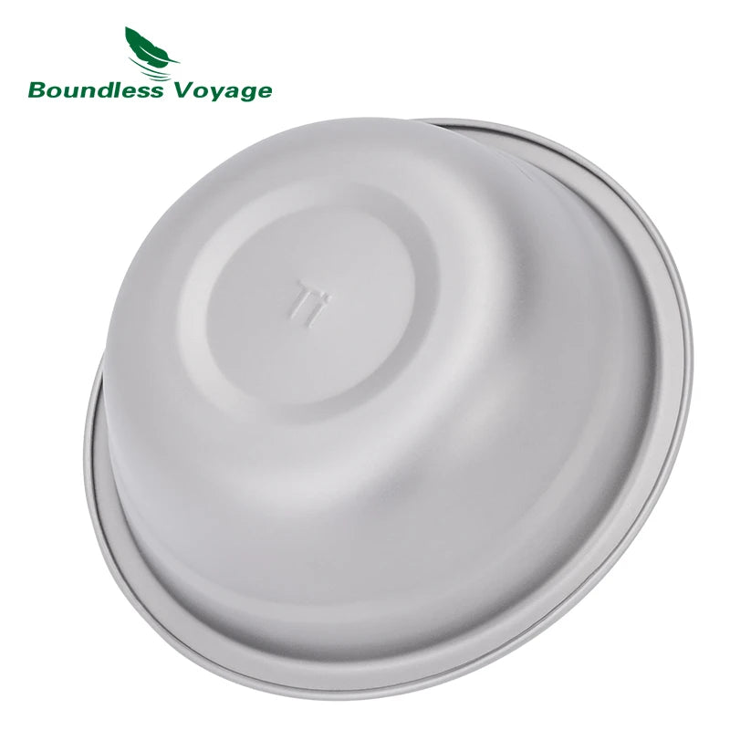Round metallic object with 'Boundless Voyage' branding on a white background
