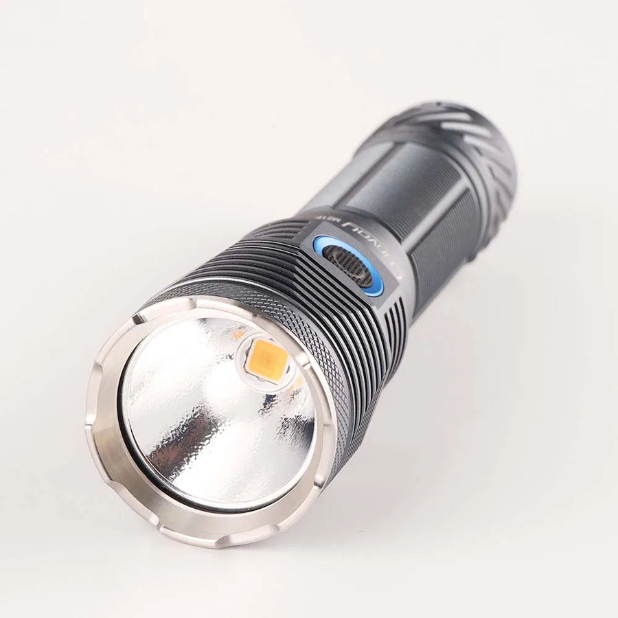 Close-up of a flashlight on a white background