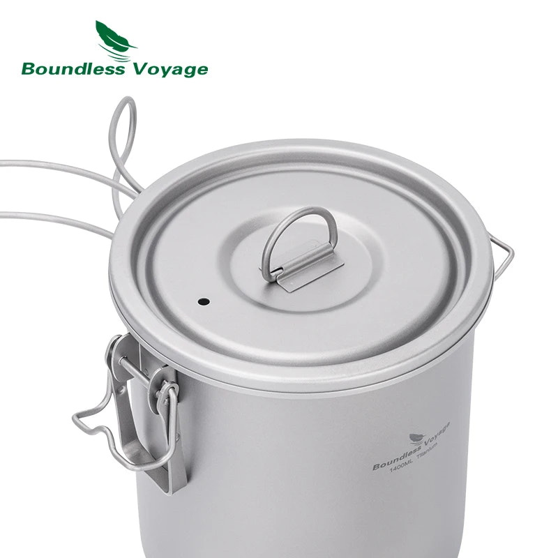 Camping pot with lid on a white background, featuring Boundless Voyage branding.