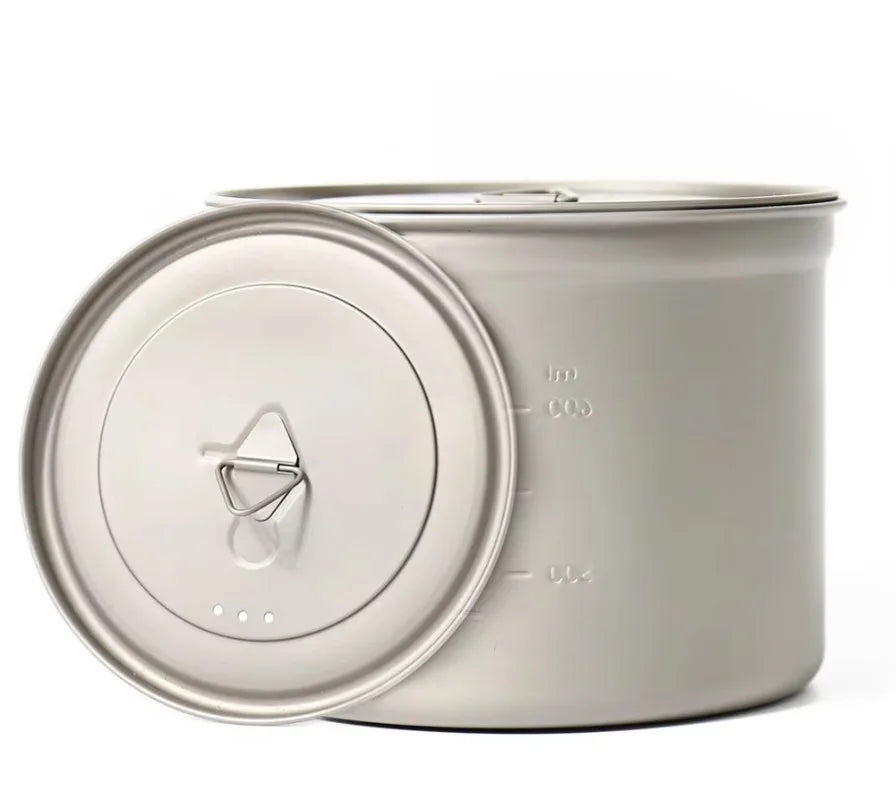 titanium pot with lid on a white background