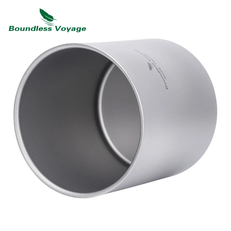 Gray metal cup with 'Boundless Voyage' logo on a white background