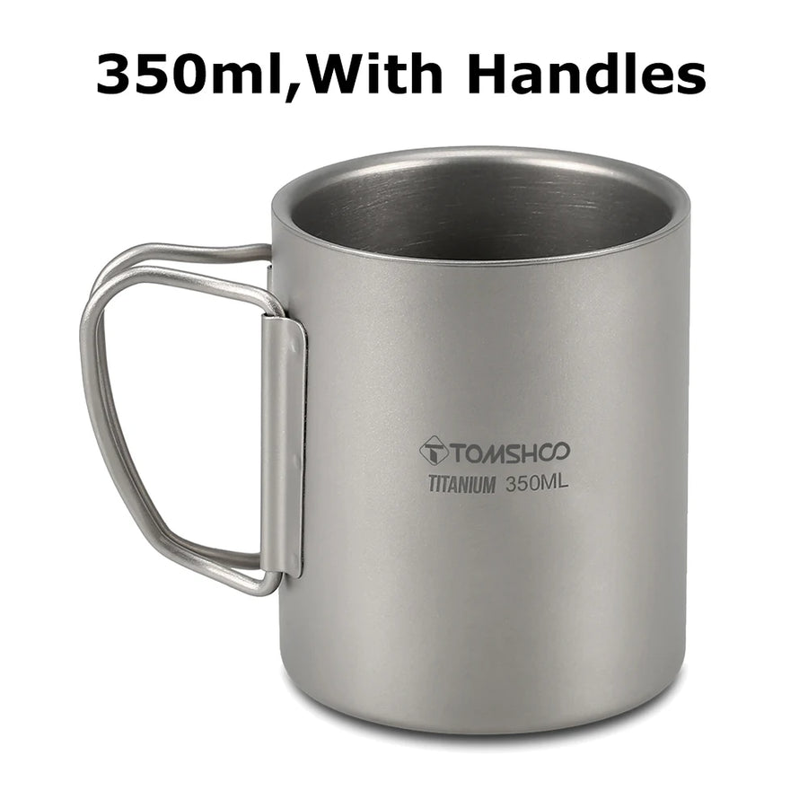 titanium mug with handles and 'TOMSHOO' branding on a white background
