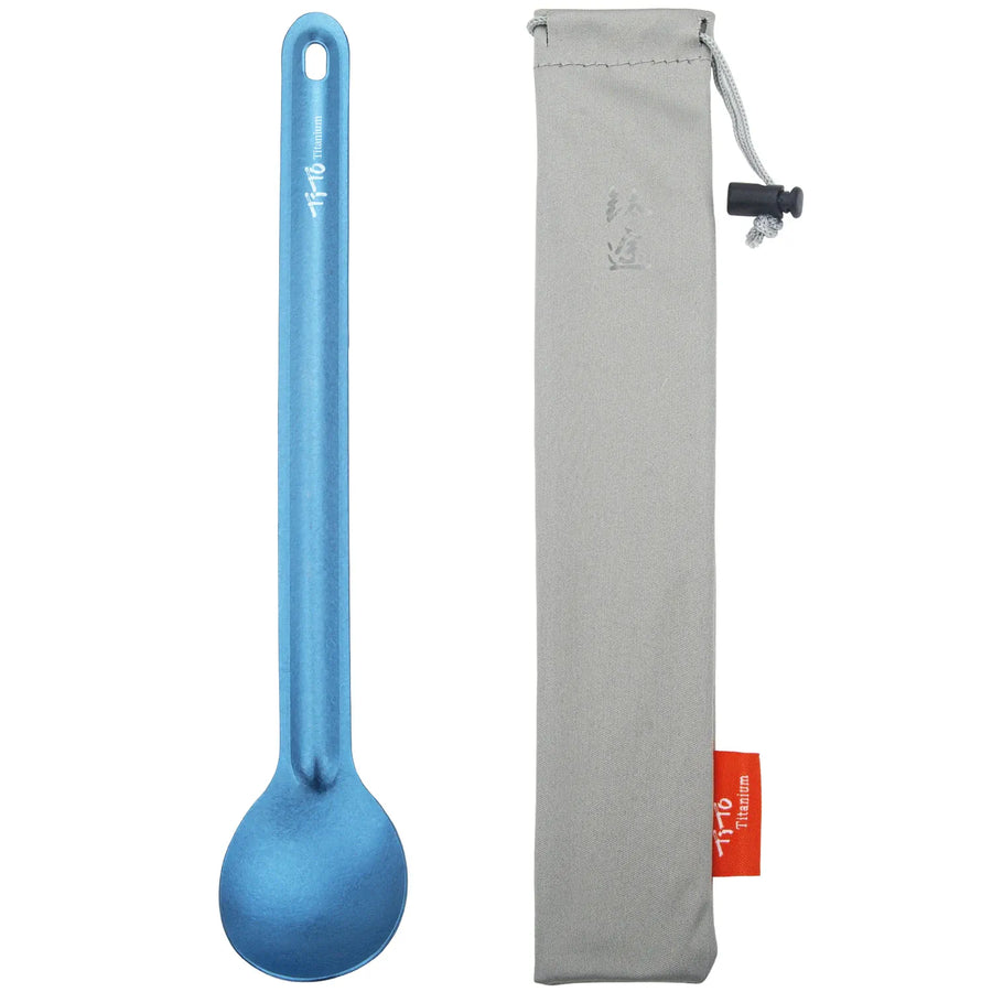 Blue spoon with a gray pouch on a white background