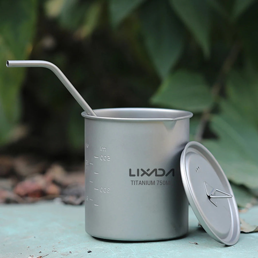 Silver Lixada titanium cup with straw on a natural background