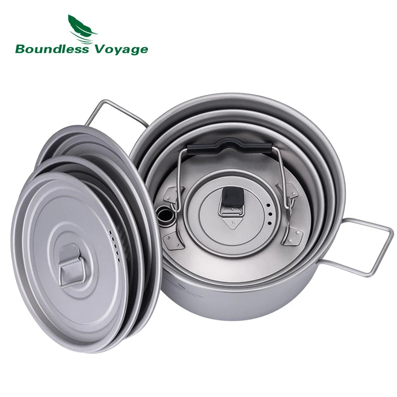 Set of camping cookware with lids on a white background, featuring 'Boundless Voyage' brand.