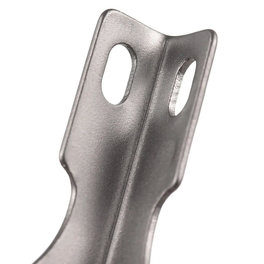 Metallic object with a textured surface on a white background