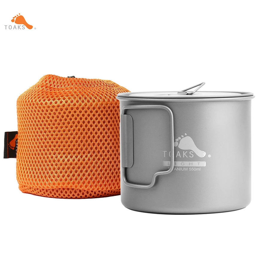 Gray camping mug with handle and orange mesh pouch on a white background, featuring Toaks logo.
