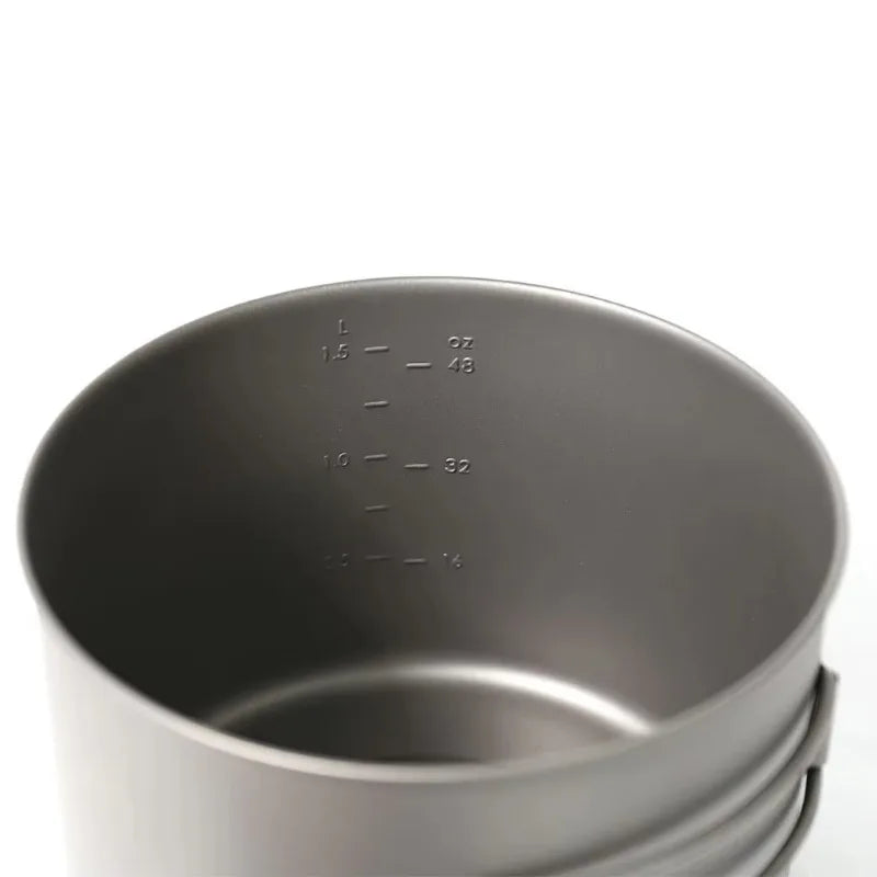 Metal cup with measurement markings on a white background