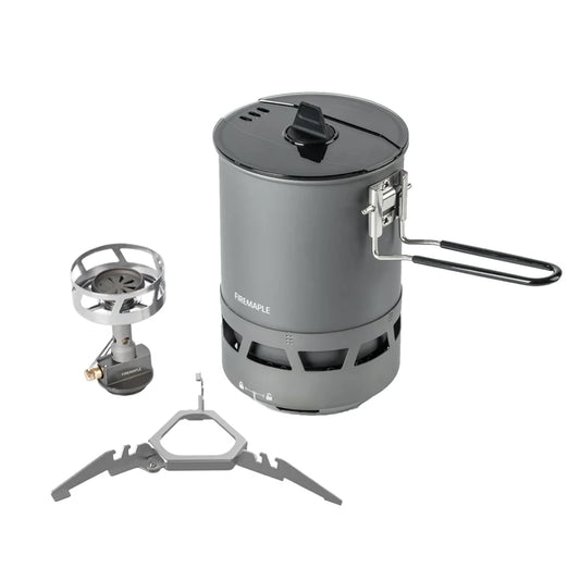 Portable camping stove with accessories on a white background
