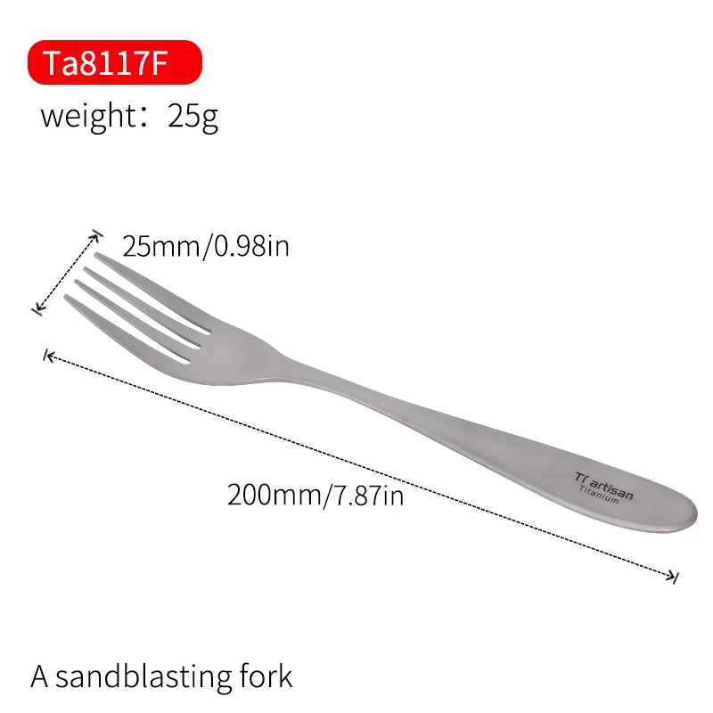 A polished titanium spoon and fork placed on a wooden board with a lemon and garlic in the background.