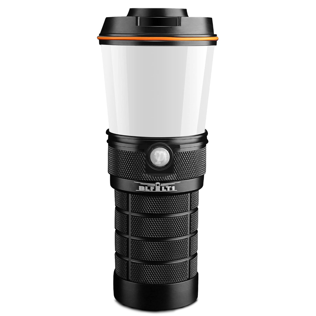 Black and orange camping lantern on a white background