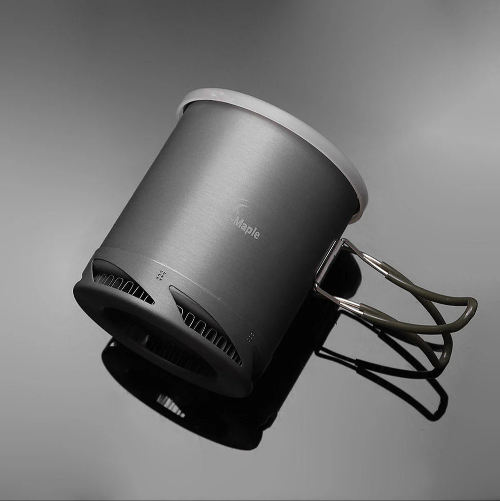 Gray pot with heat exchanger on a gray background