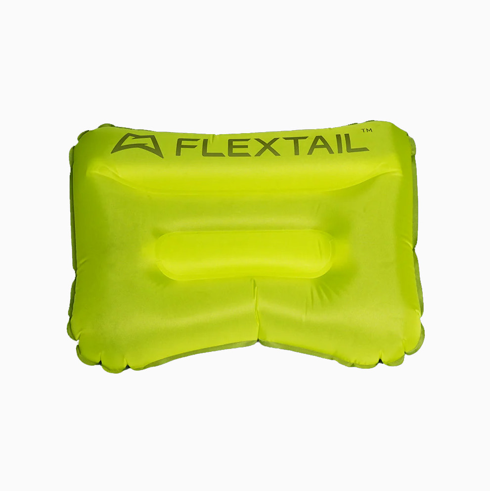 Yellow inflatable pillow with 'Flextail' branding on a white background