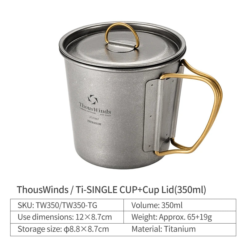 Titanium cup with gold handle and lid on a white background, featuring the ThouWinds brand.