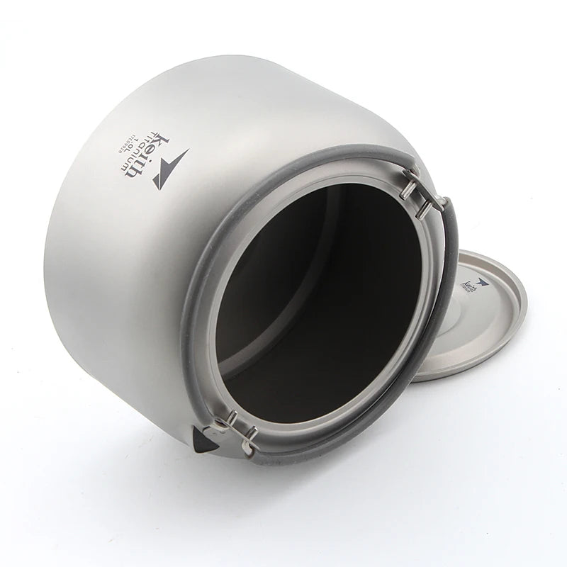 titanium pot with lid on a white background
