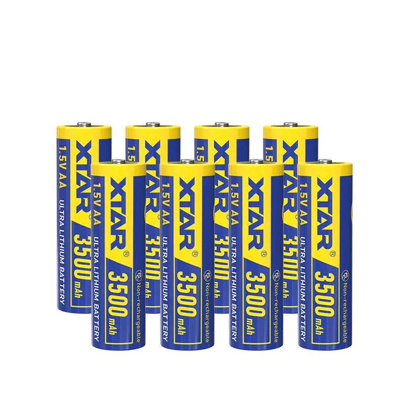 Eight Xtar lithium batteries with blue and yellow labels on a white background